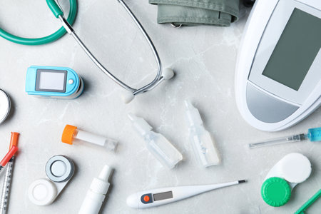 Flat lay composition with medical objects on gray backgroundの写真素材
