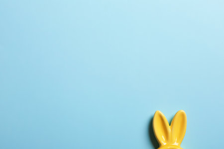 Easter bunny ears on color background, top view. Space for textの写真素材