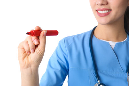 Medical student with marker on white background, closeupの写真素材