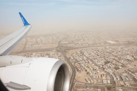DUBAI, UNITED ARAB EMIRATES - NOVEMBER 06, 2018: Panoramic view of the city from Flydubai planeのeditorial素材