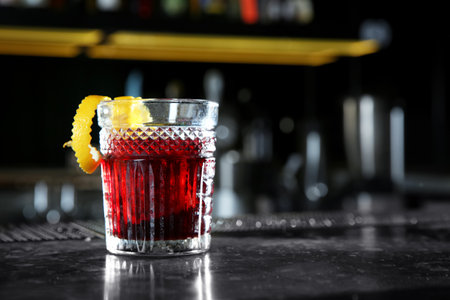 Fresh alcoholic Red Russian cocktail on bar counter. Space for textの写真素材