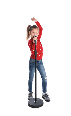 Cute funny girl with microphone on white backgroundの写真素材