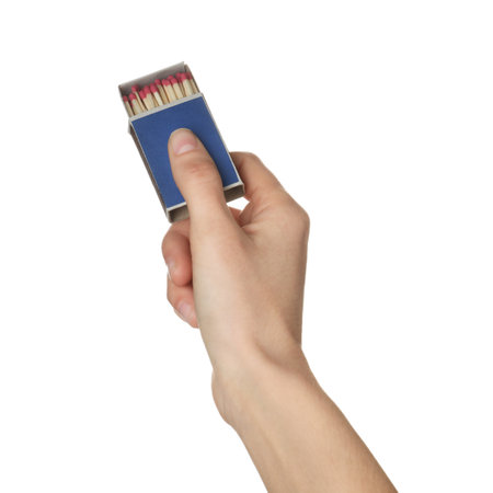 Woman holding box with matches on white background, closeupの写真素材