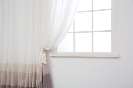 Modern window with curtain in room, space for text. home interior