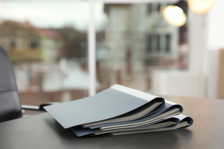 Stack of folders with documents on office table. Space for textの写真素材