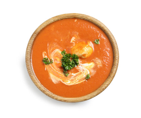 Bowl of delicious butter chicken on white background, top view. Traditional Indian Murgh Makhaniの写真素材