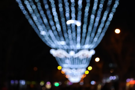 Beautiful bright Christmas decor outdoors, low angle view. bokeh effectの写真素材