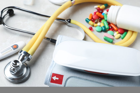 Set of medical objects on gray table