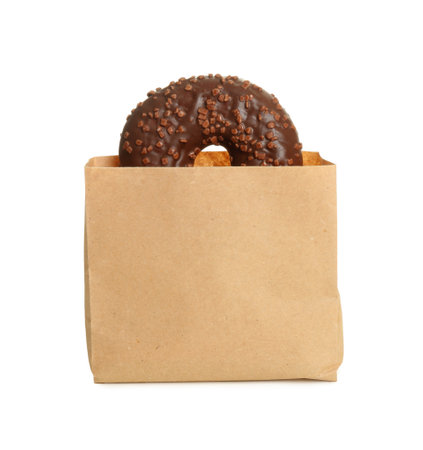 Paper bag with donut on white background. space for designの写真素材