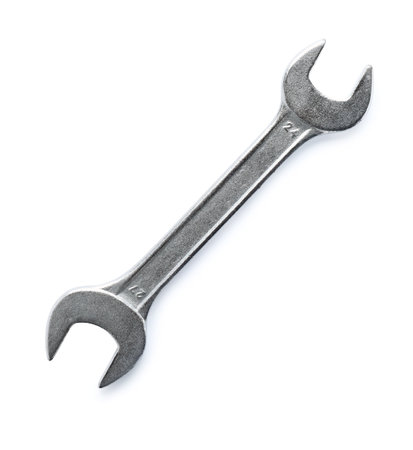 New wrench on white background, top view. Plumber Tools