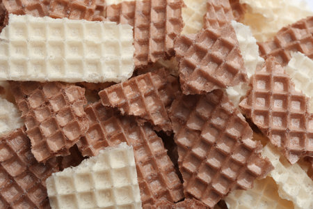 Tasty crumbled wafers as background, top view. Crispy foodの写真素材