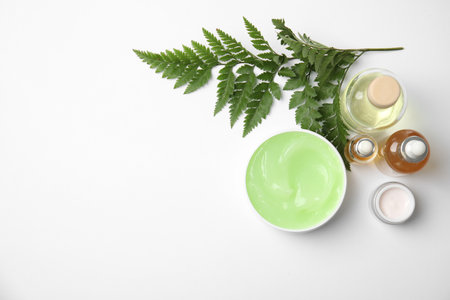 Flat lay composition with different body care products and space for text on white backgroundの写真素材