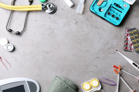 Flat lay composition with medical objects and space for text on gray backgroundの写真素材