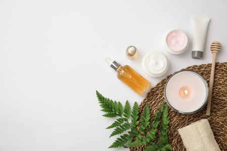 Flat lay composition with different body care products and space for text on white backgroundの写真素材