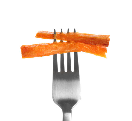 Fork with tasty sweet potato fries on white backgroundの写真素材