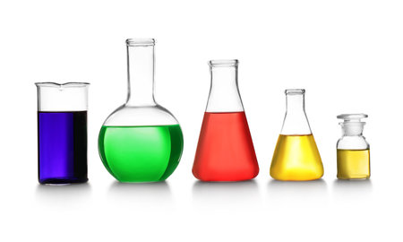 Laboratory glassware with different samples on white background. solution chemistryの写真素材