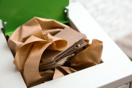 Trash bin with paper and cardboard, closeup. Recycling conceptの写真素材