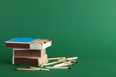 Composition with matches and space for text on color backgroundの写真素材