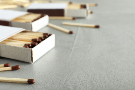Composition with matches and space for text on light backgroundの写真素材