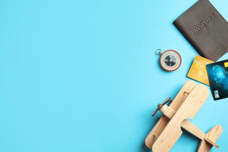 Flat lay composition with tourist items and space for text on color background. travel agency