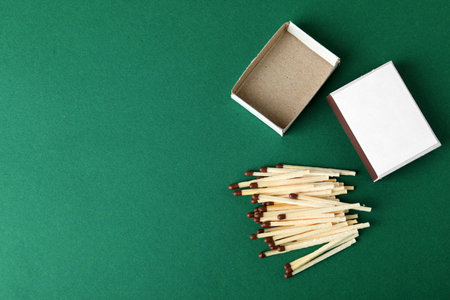 Flat lay composition with matches and space for text on color backgroundの写真素材