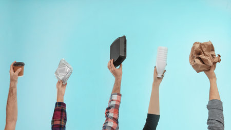 People holding different garbage on color background. Waste recycling concept
