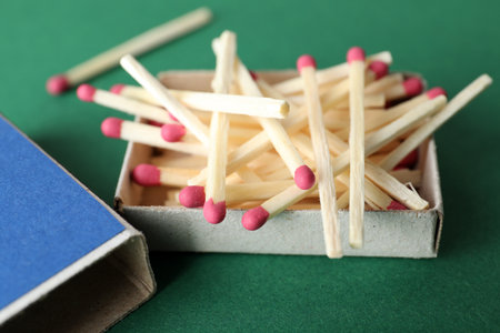 Open box with matches on color background, closeupの写真素材