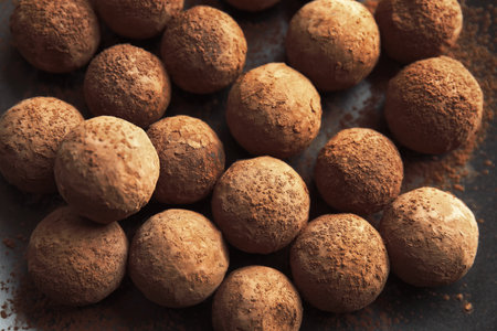 Tasty chocolate truffles on dark background, closeupの写真素材