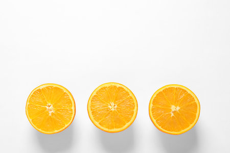 Juicy oranges on white background, top viewの写真素材