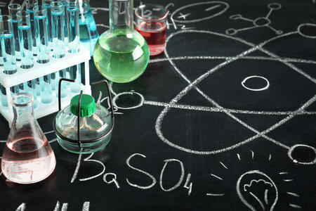 Composition with laboratory equipment on chalkboard. Chemistry conceptの写真素材