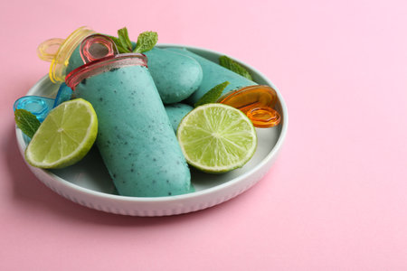 Plate with delicious spirulina and lime on color background. Space for textの写真素材