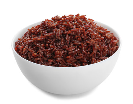 Bowl of cooked brown rice isolated on whiteの写真素材