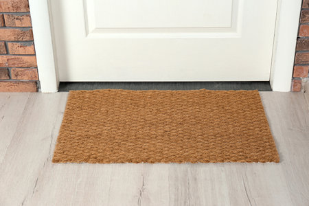 New clean mat near entrance door. household itemの写真素材