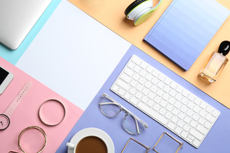 Flat lay composition with keyboard, accessories and space for text on color background. fashion bloggerの写真素材