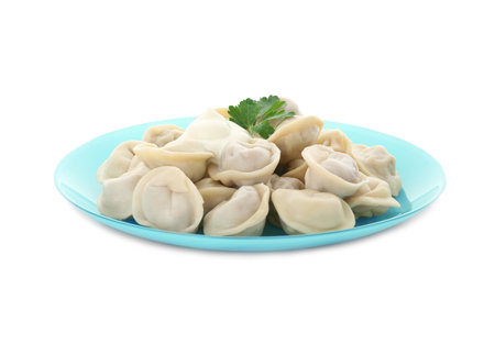 Plate with tasty dumplings isolated on whiteの写真素材