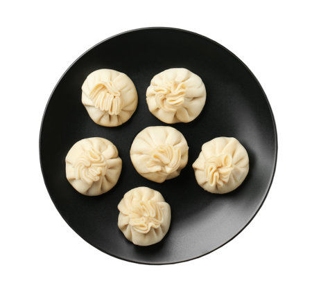 Plate with tasty dumplings isolated on white, top viewの写真素材