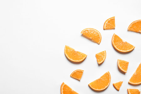Composition with orange slices on white background, top viewの写真素材