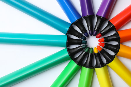 Flat lay composition with colorful markers on white background. rainbow paletteの写真素材