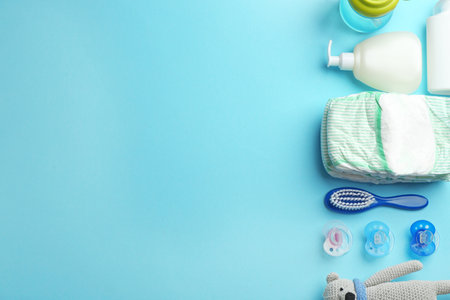 Flat lay composition with baby accessories and space for text on color backgroundの写真素材