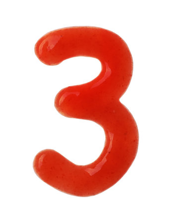 Number 3 written with red sauce on white backgroundの写真素材