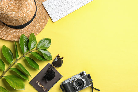 Flat lay composition with accessories, camera and space for text on color background. travel blogger