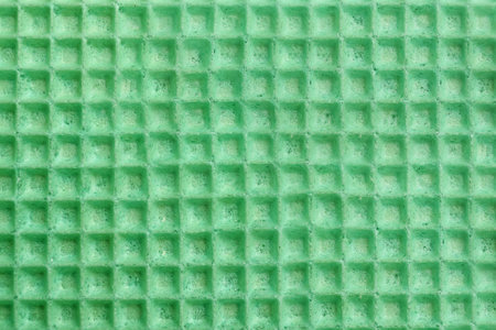 Tasty wafer as background, closeup. Crispy food