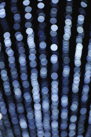 Blurred lights on black background. bokeh effectの写真素材