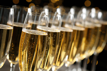 Many glasses of champagne on blurred background, closeupの写真素材