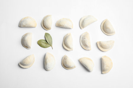 Raw dumplings on white background, top view. home cookingの写真素材