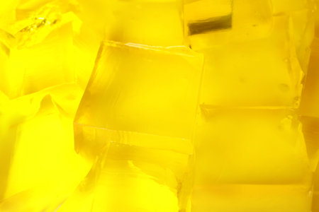 Tasty natural jelly cubes as background, closeupの写真素材