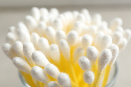 Cotton swabs on gray background, closeup viewの写真素材