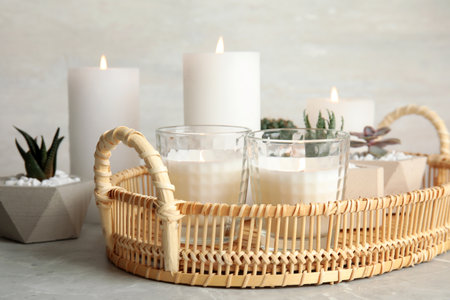 Beautiful composition with burning candles on tableの写真素材
