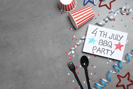 Flat lay composition with dishware and card on color background, space for text. USA Independence Dayの写真素材