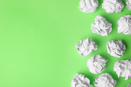 Paper balls on color background, flat lay. Space for textの写真素材